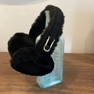 UGG Classic Shearling earmuffs in black.